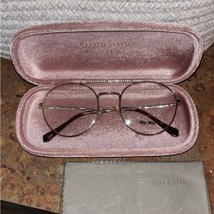 Miu Miu Elegant Gold Glasses